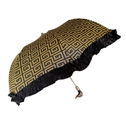 Automatic women's folding umbrella with black ruffle and Greek design, featuring compact, stylish protection from rain.