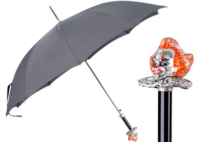 Grey men's umbrella with a hand-painted clown handle, showcasing Italian craftsmanship and stylish design.