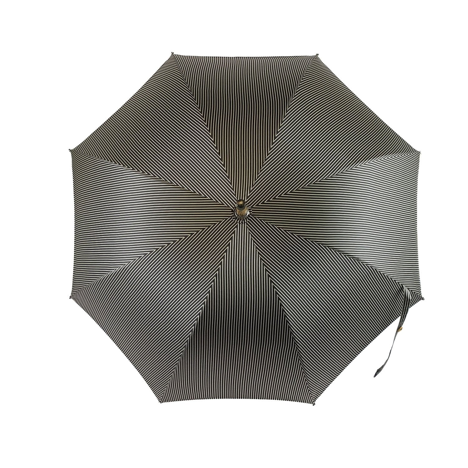 Black and white men's umbrella with a hand-curved Malacca wood handle by Ilmarchesato, featuring a classic, elegant design.