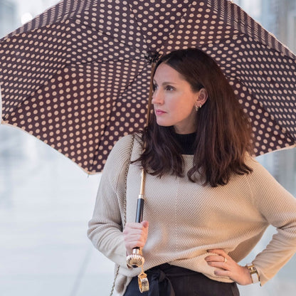 Handmade Pasotti classic polka dots umbrella with double cloth canopy and jeweled handle, perfect for rainy days.