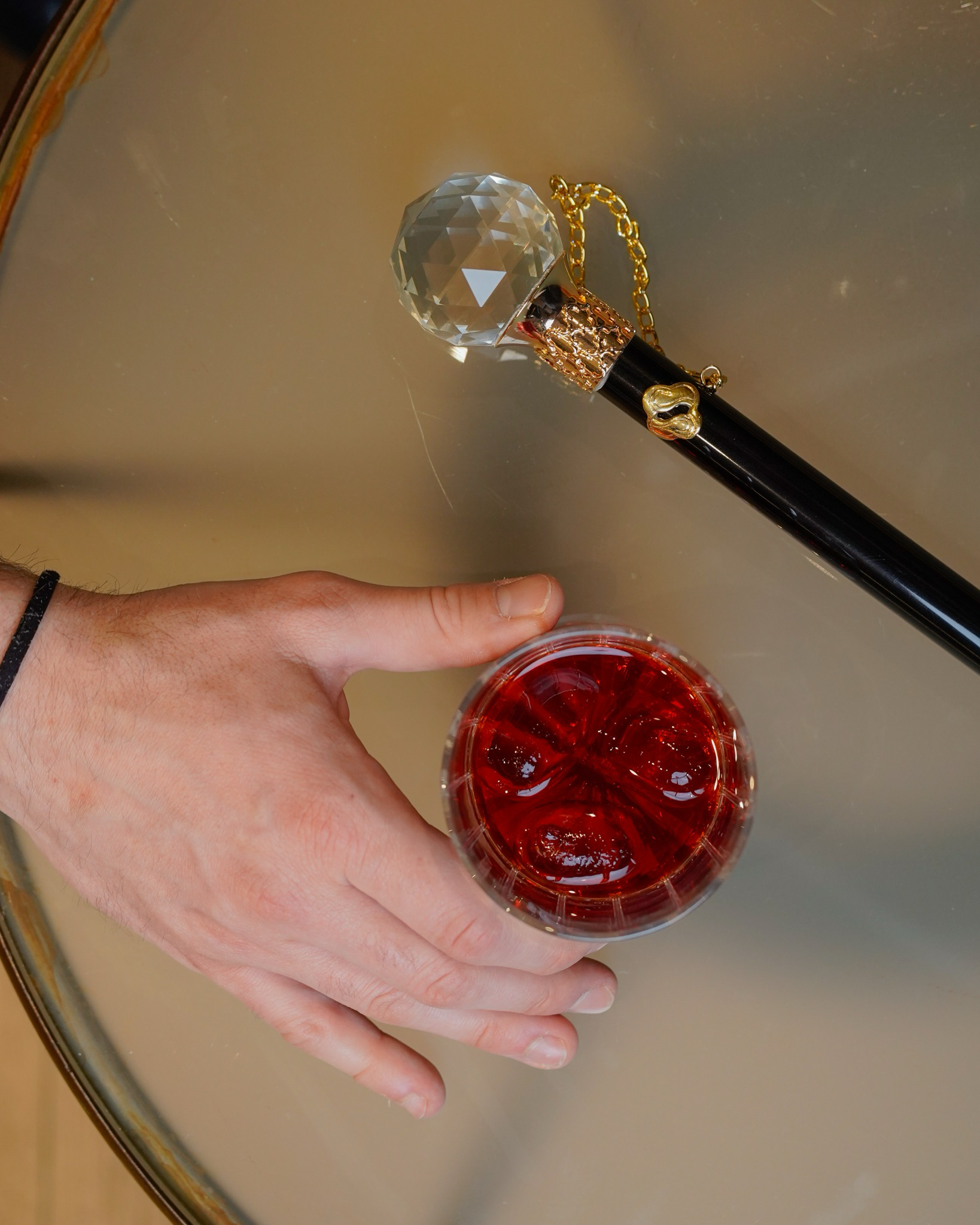 Handcrafted luxury shoehorn with crystal handle and 24K gold-plated brass, 53 cm long, elegant footwear accessory.