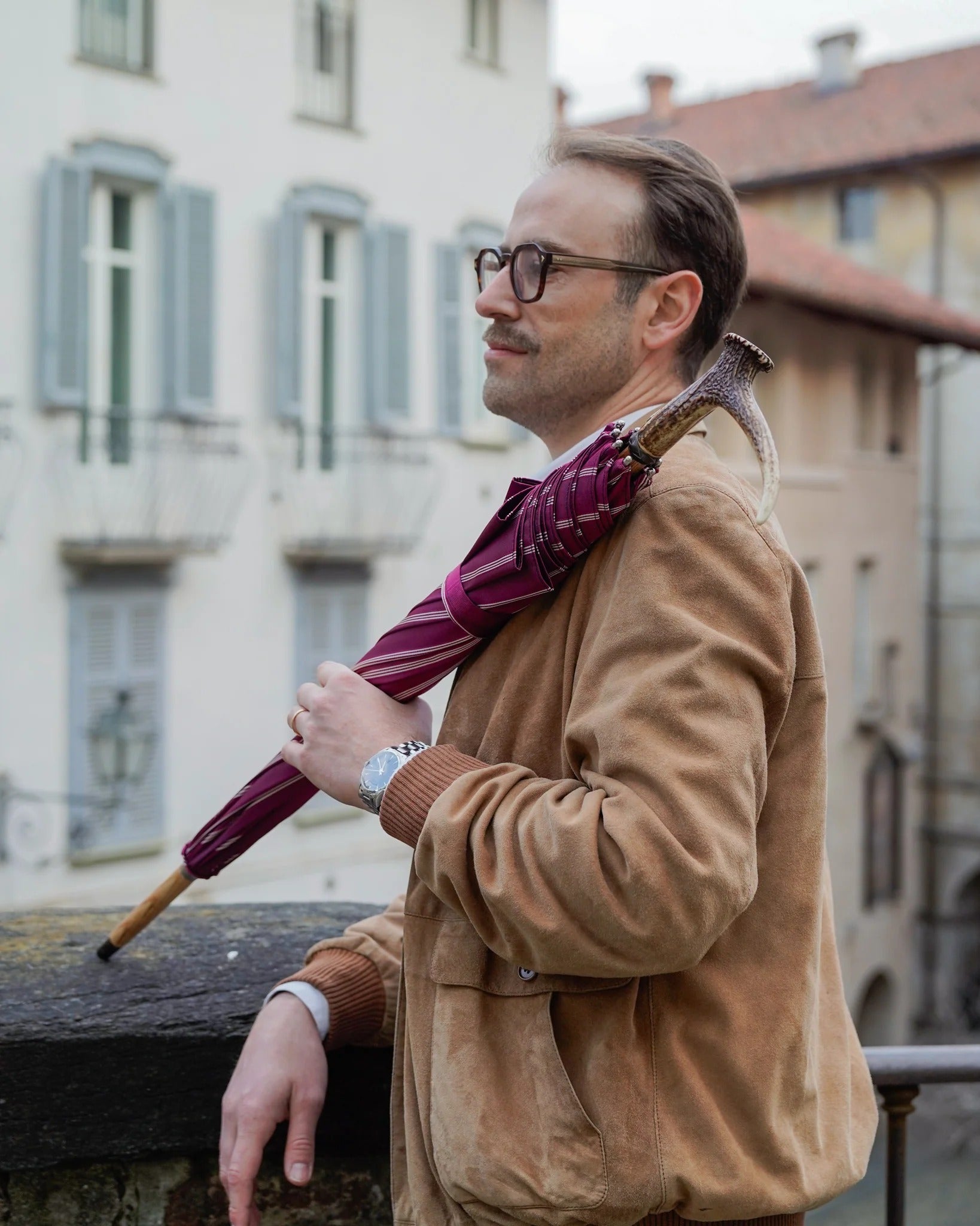 Handmade Jacquard umbrella for men with burgundy canopy and beech wood handle, featuring an elegant antler design.