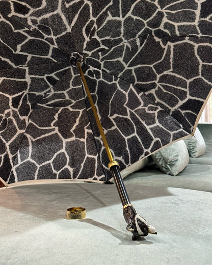 Handmade Italian rain umbrella by Pasotti with a luxury raccoon handle and elegant design.