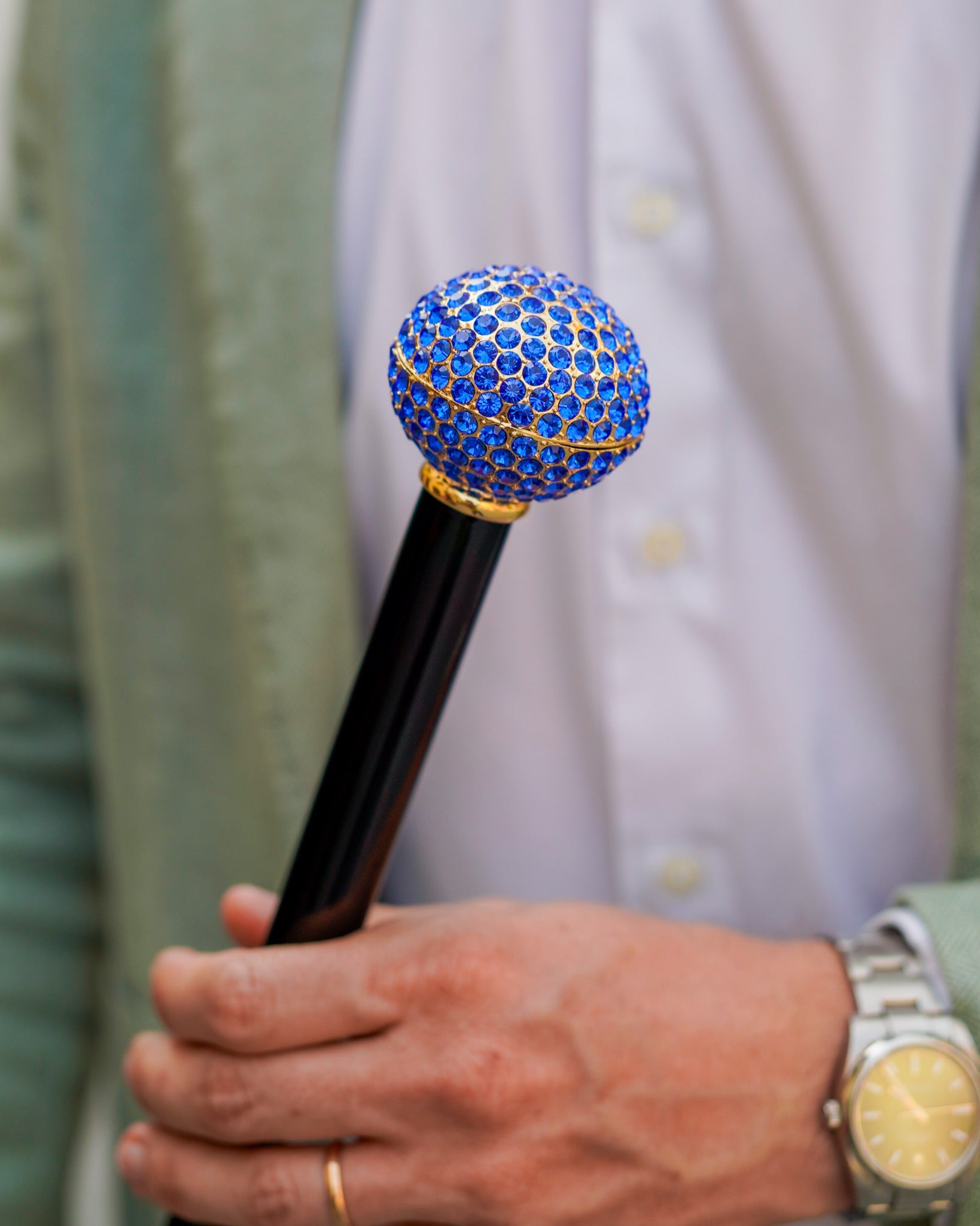 Luxury Ilmarchesato walking cane with 24K gold handle and sapphire crystals, showcasing an elegant and collectible design.