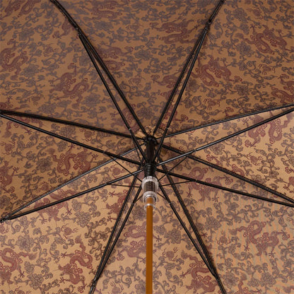 Pasotti men's burgundy umbrella featuring a luxurious golden dragon design and artisan craftsmanship.