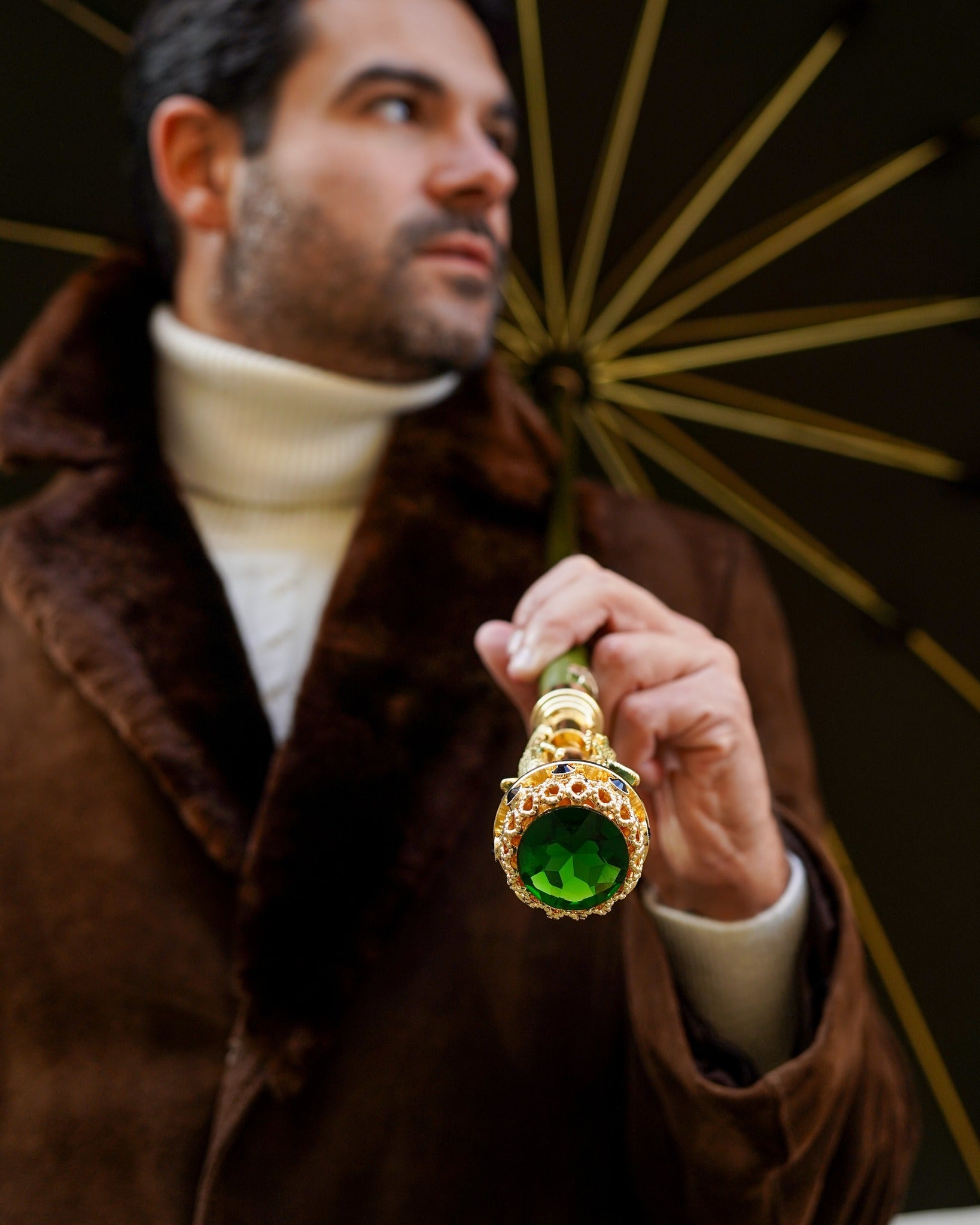 Handmade dark green men's umbrella by Ilmarchesato with 24K gold handle, stylish rain protection for men.