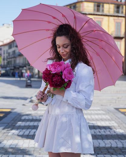 Pink luxury men's umbrella by Ilmarchesato with a 24K gold handle and genuine quartz stone for a stylish, limited edition accessory.
