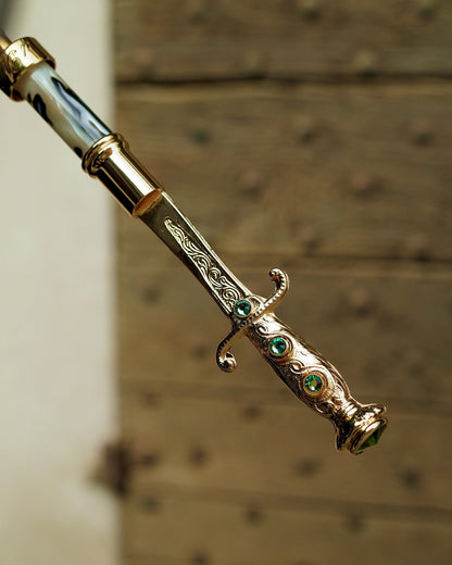 Men's green luxury automatic umbrella with 24K gold sword handle by Ilmarchesato, featuring a sleek design and sturdy canopy.