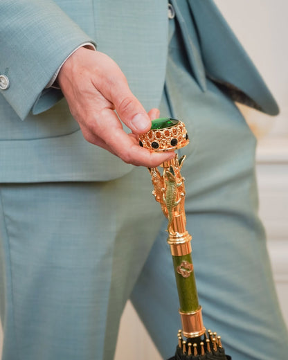 Handmade Italian dark green men's umbrella with 24K gold handle, luxury rain protection by Ilmarchesato.