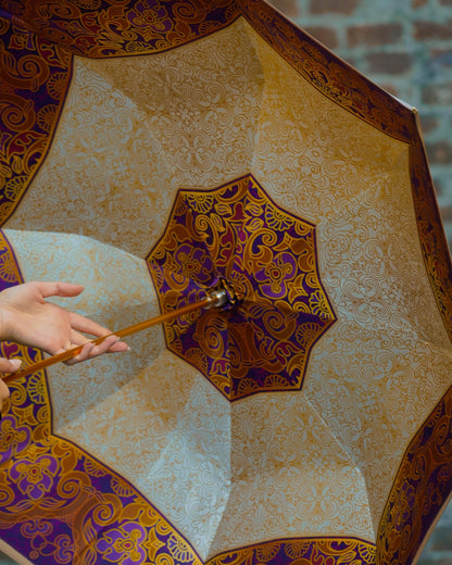 Ilmarchesato cream double fabric rain umbrella with gold handle and UV protection, showcasing luxurious design and sturdy construction.