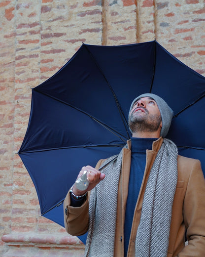 Elegant handmade Italian men's umbrella with silver-plated hawk handle and classic canopy, stylish and durable for rainy weather.