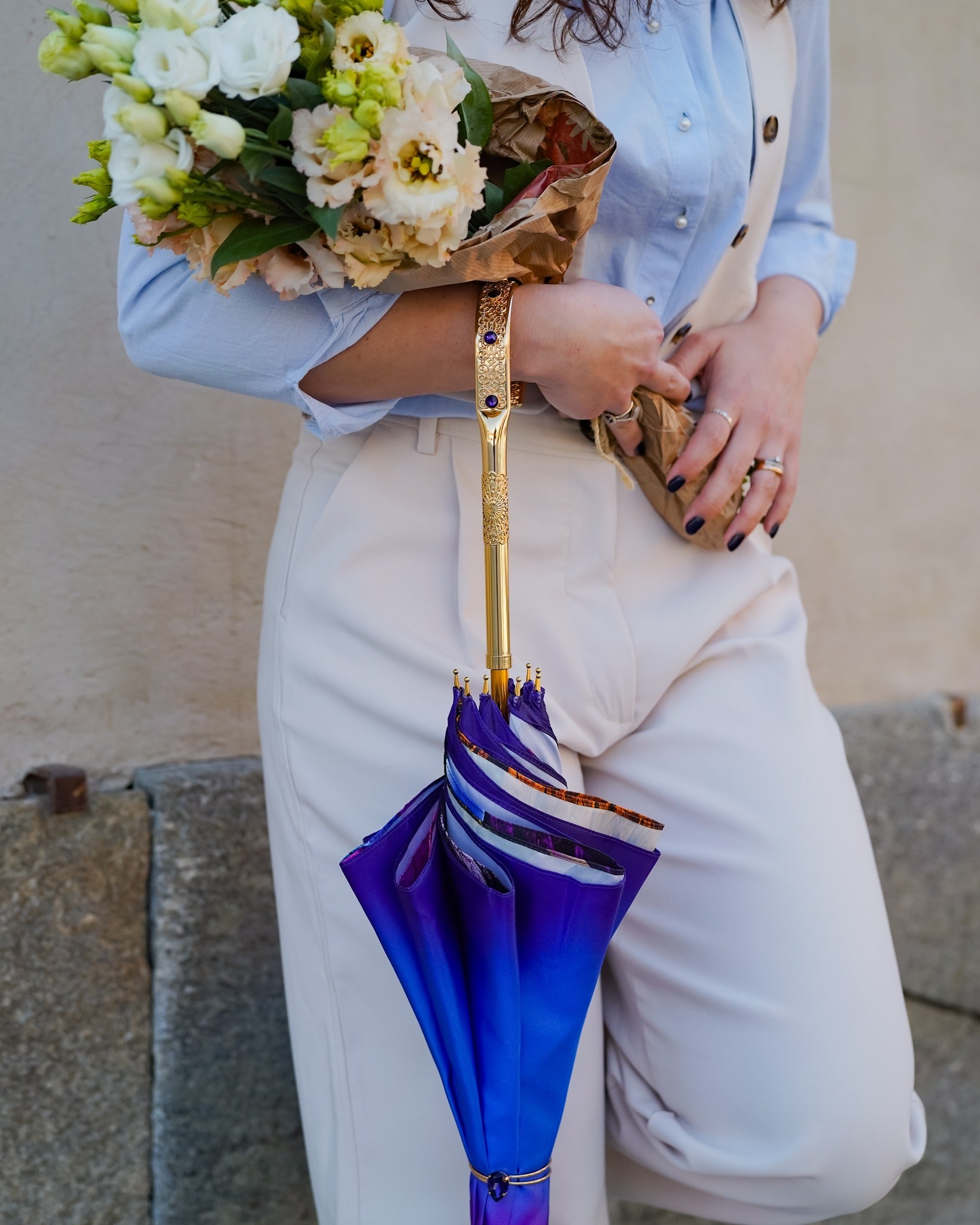 Luxury purple rain umbrella by Ilmarchesato with double canopy, gold-plated handle, handmade Italian craftsmanship.