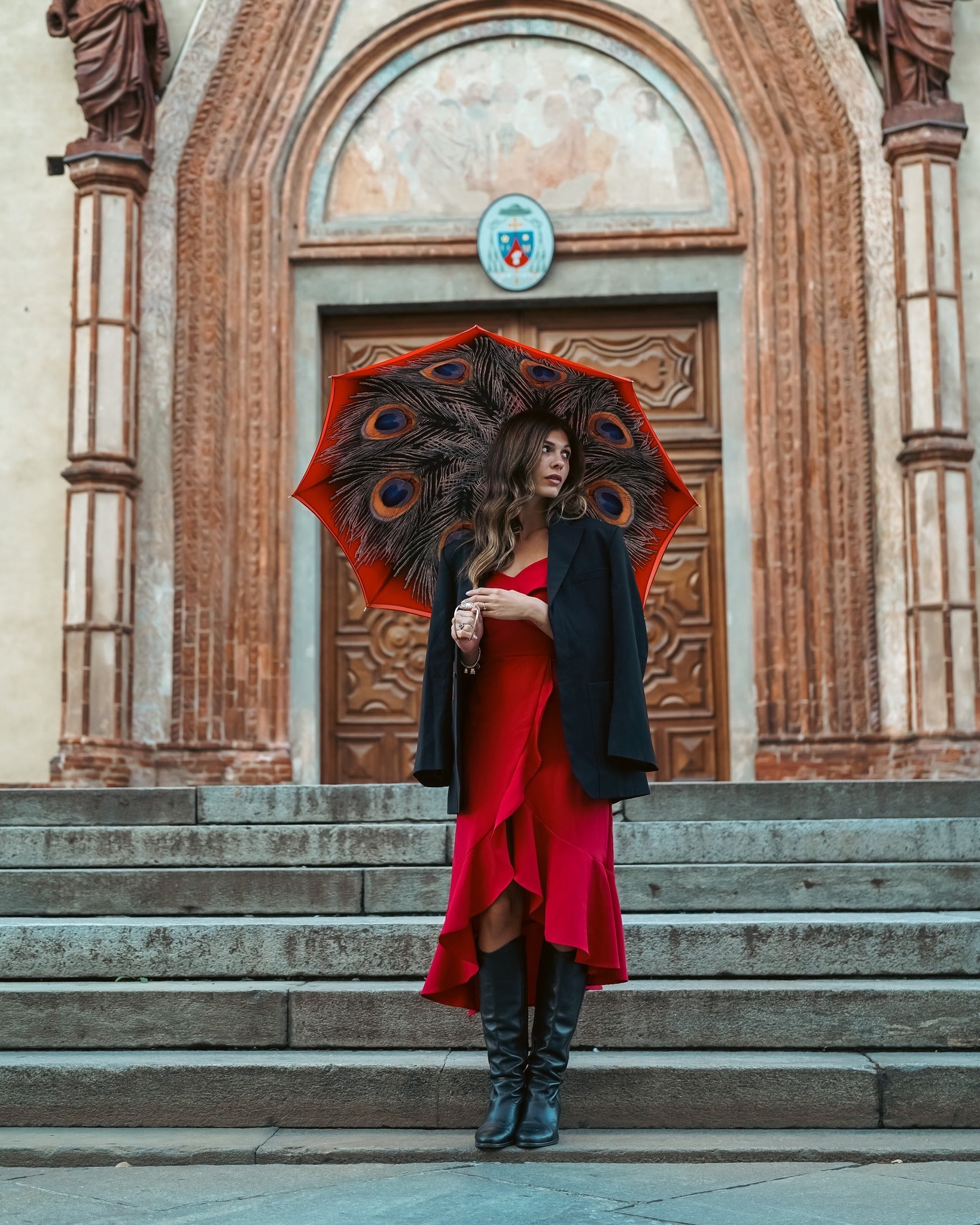 Elegant red satin women's rain umbrella with peacock print by Ilmarchesato, featuring a stylish and durable design.