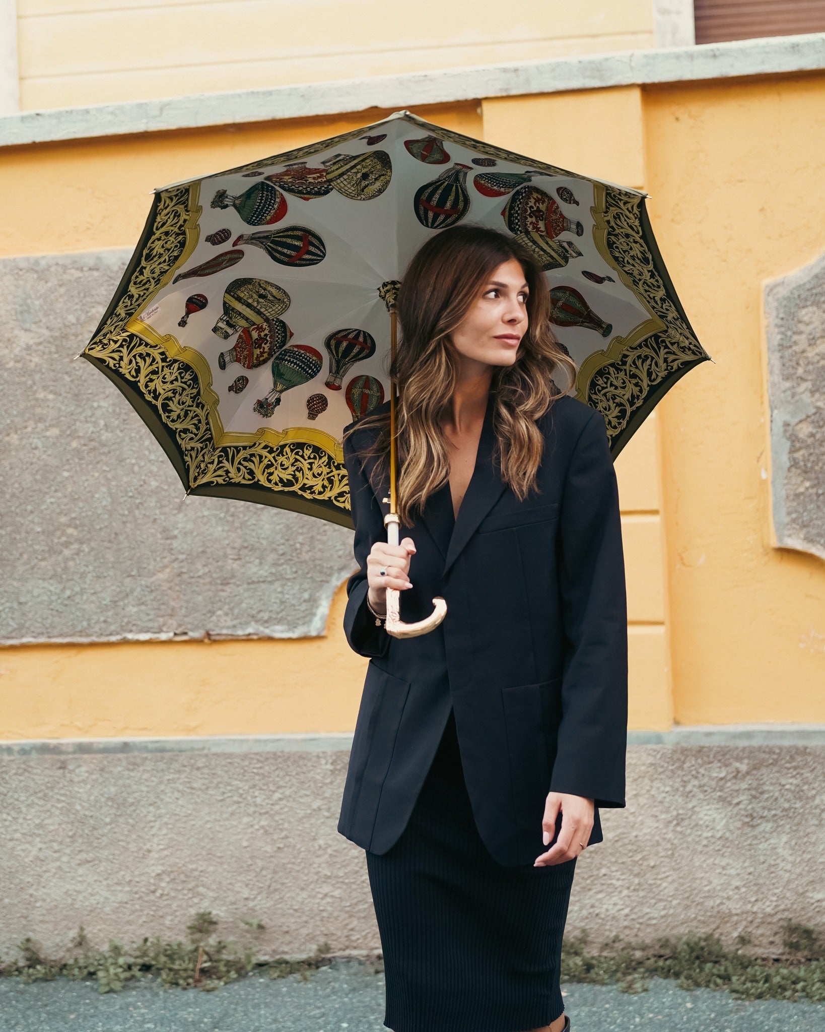Luxury satin canopy hot air balloon rain umbrella by Ilmarchesato with gold-plated handle and automatic opening feature.