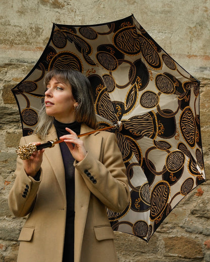 Luxury satin rain umbrella with hand-painted Medusa handle, 24K gold accents, Italian craftsmanship by Ilmarchesato