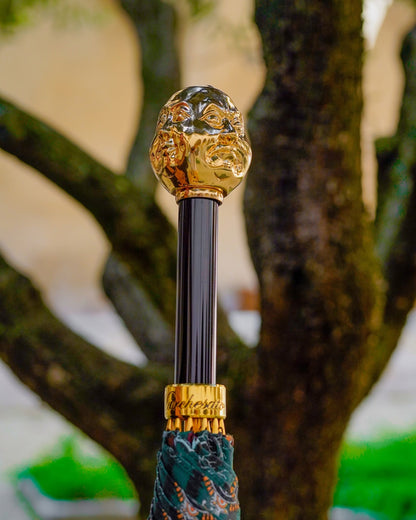 Men's paisley umbrella by Ilmarchesato with automatic opening, gold-plated handle, and fibercarbon frame, shown open with detailed design.