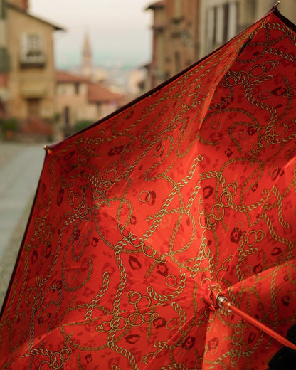 Red luxury rain umbrella with satin finish, gold Chihuahua handle, automatic opening by Ilmarchesato.