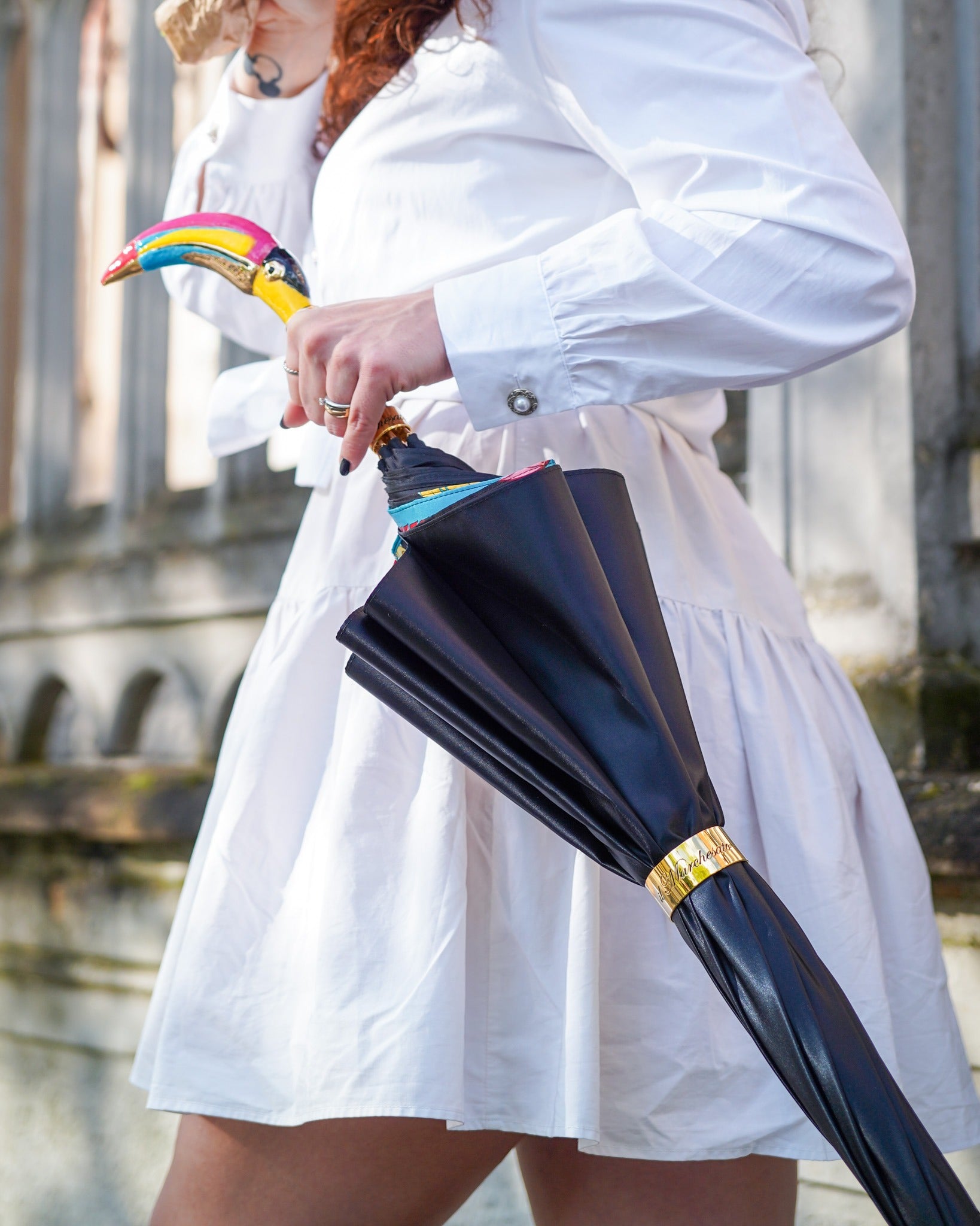 Handcrafted artisan Italian rain umbrella by Ilmarchesato with a 24K gold-plated toucan handle, featuring a classic design and luxury details.