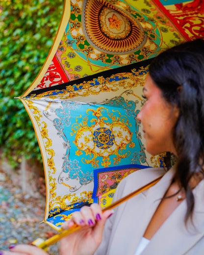 Luxury Italian rain umbrella by Ilmarchesato with hand-painted design, 24K gold handle, satin canopy for elegant protection.