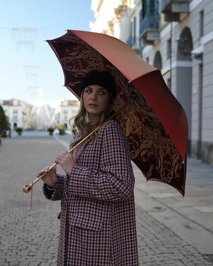 Luxury Burgundy Ilmarchesato rain umbrella with automatic opening, regal crown design, red stone handle, and elegant craftsmanship.