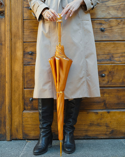 Orange leopard print rain umbrella with a 24K gold handle, handmade luxury rain umbrella by Ilmarchesato.