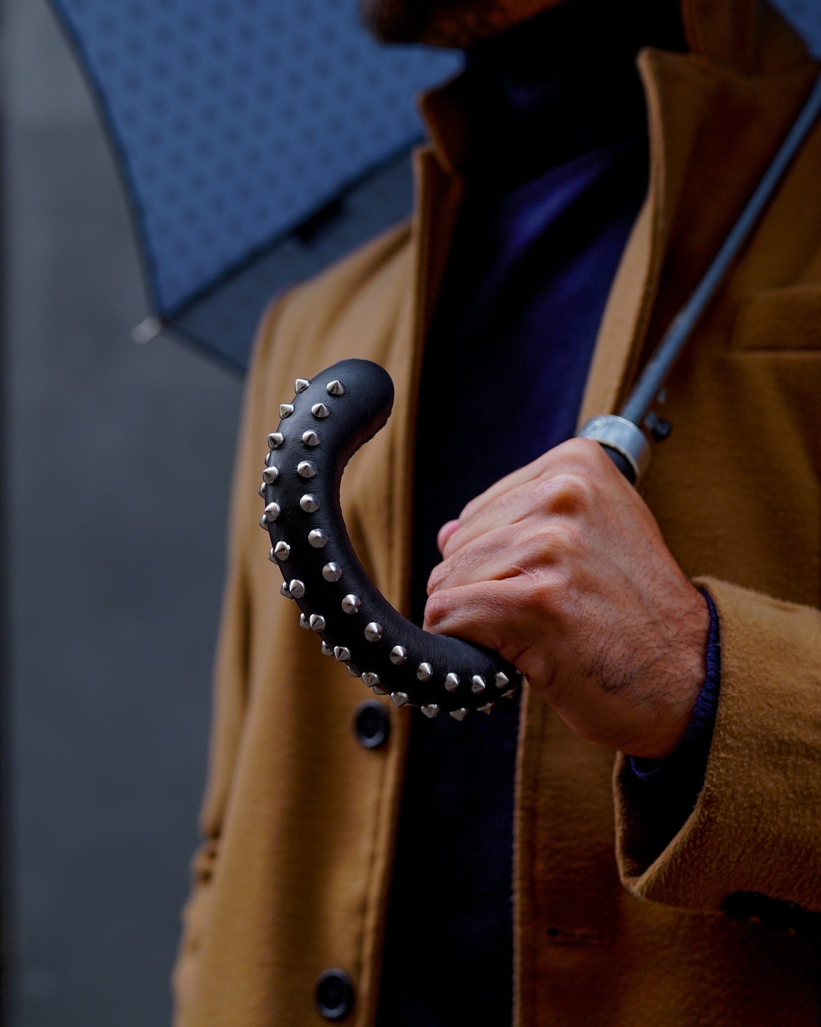 Men's premium umbrella with rock-style studded leather handle and durable carbon fiber ribs by Ilmarchesato.