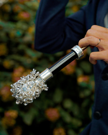 Silverplated Medusa umbrella for men with black Greek pattern, automatic opening rain umbrella by Ilmarchesato, features intricate design.