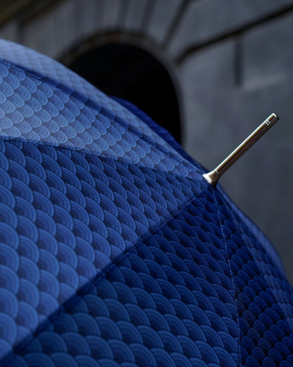 Men's premium umbrella with rock-style studded leather handle and durable carbon fiber ribs, designed for stylish protection.