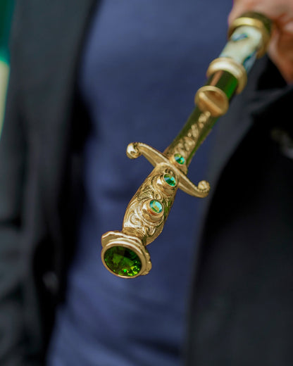 Men's green luxury automatic umbrella with 24K gold sword handle by Ilmarchesato, featuring a sleek rain-resistant canopy.