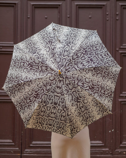Ilmarchesato designer Python rain umbrella with satin canopy and leather handle, luxury rain protection gear.