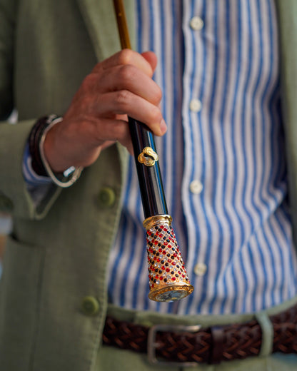 Luxury men's Black Greca umbrella by Ilmarchesato with gold handle and crystal details, stylish rain protection accessory.
