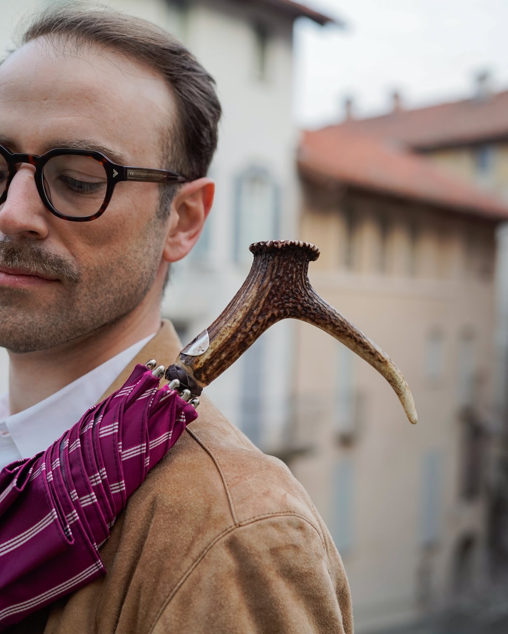 Handmade Jacquard umbrella for men with burgundy canopy and beech wood handle, featuring intricate woven fabric design.