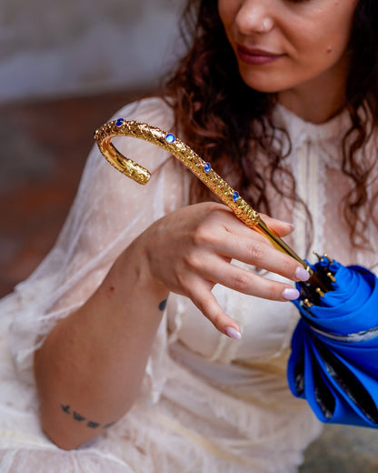 Blue floral rain umbrella for women by Ilmarchesato, featuring double cloth design and elegant floral pattern.