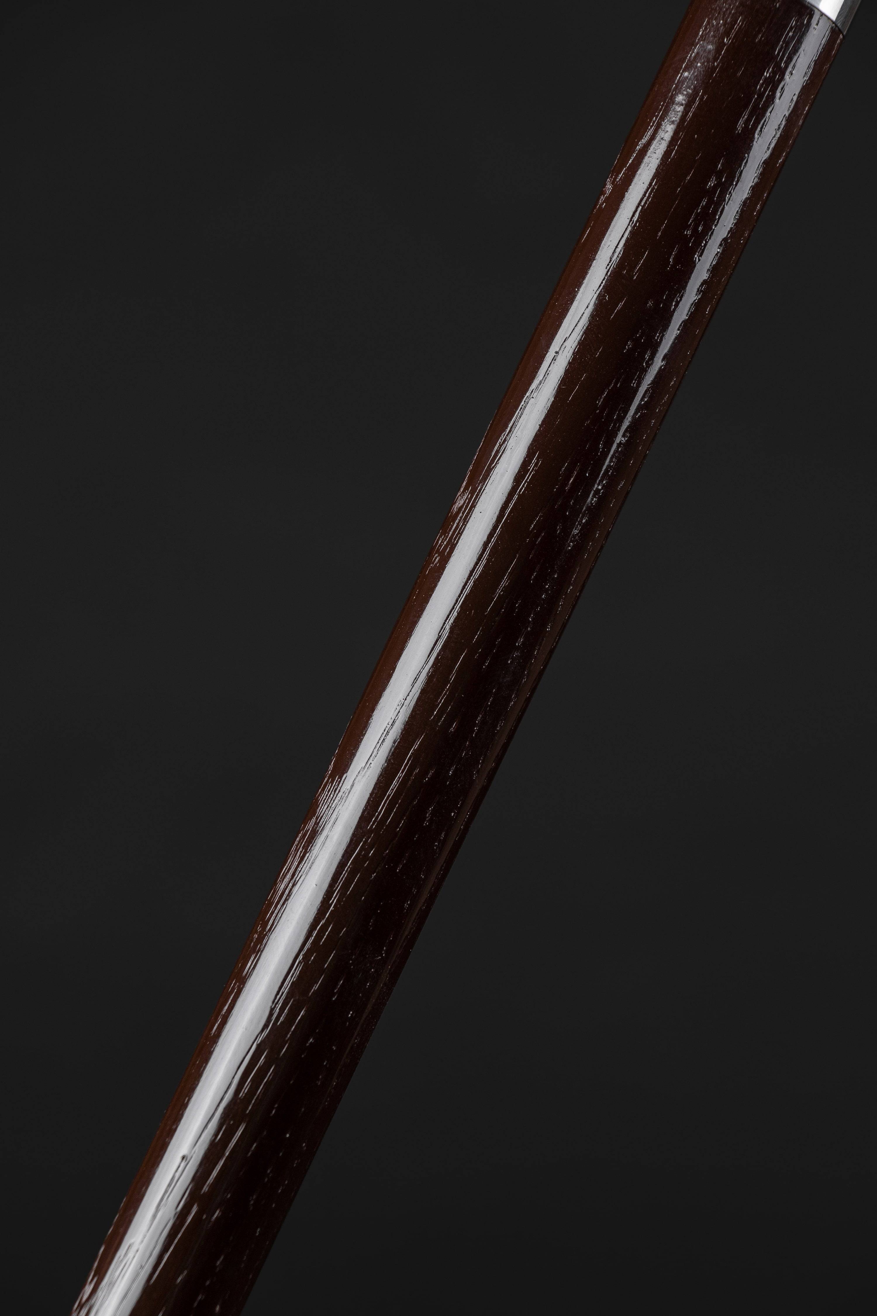 Antique fancy presentation walking cane by ARTWalkingSticks featuring a decorative handle and polished wooden shaft.