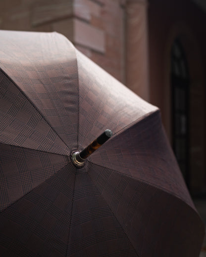 luxury men's umbrella with a wooden handle and classic patterned fabric