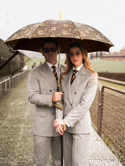 Pasotti luxury golden dragon umbrella for men, featuring modern Italian design and presented in an elegant gift box.