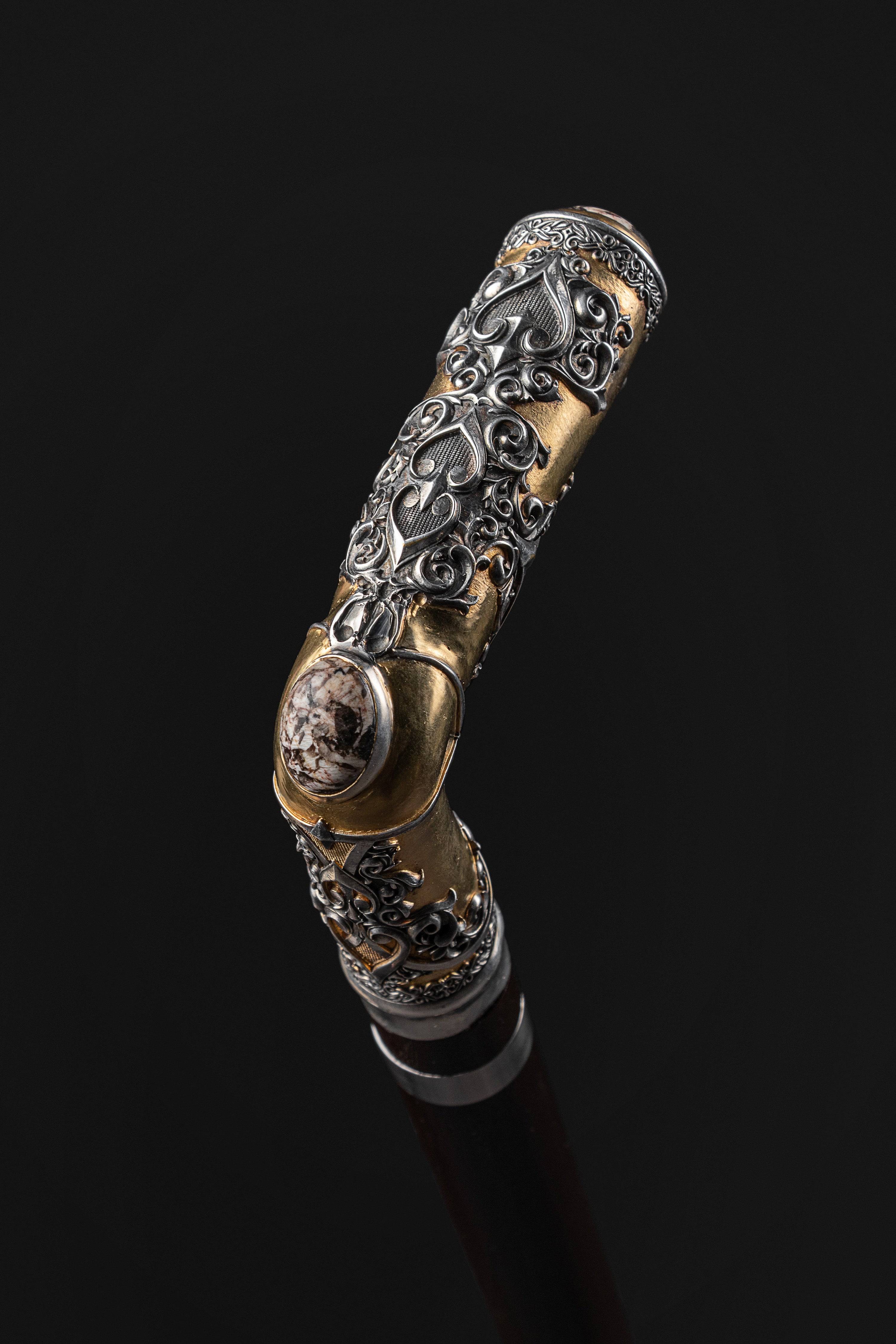 Luxury antique fancy walking cane by ARTWalkingSticks with intricate detailing and polished wood handle.
