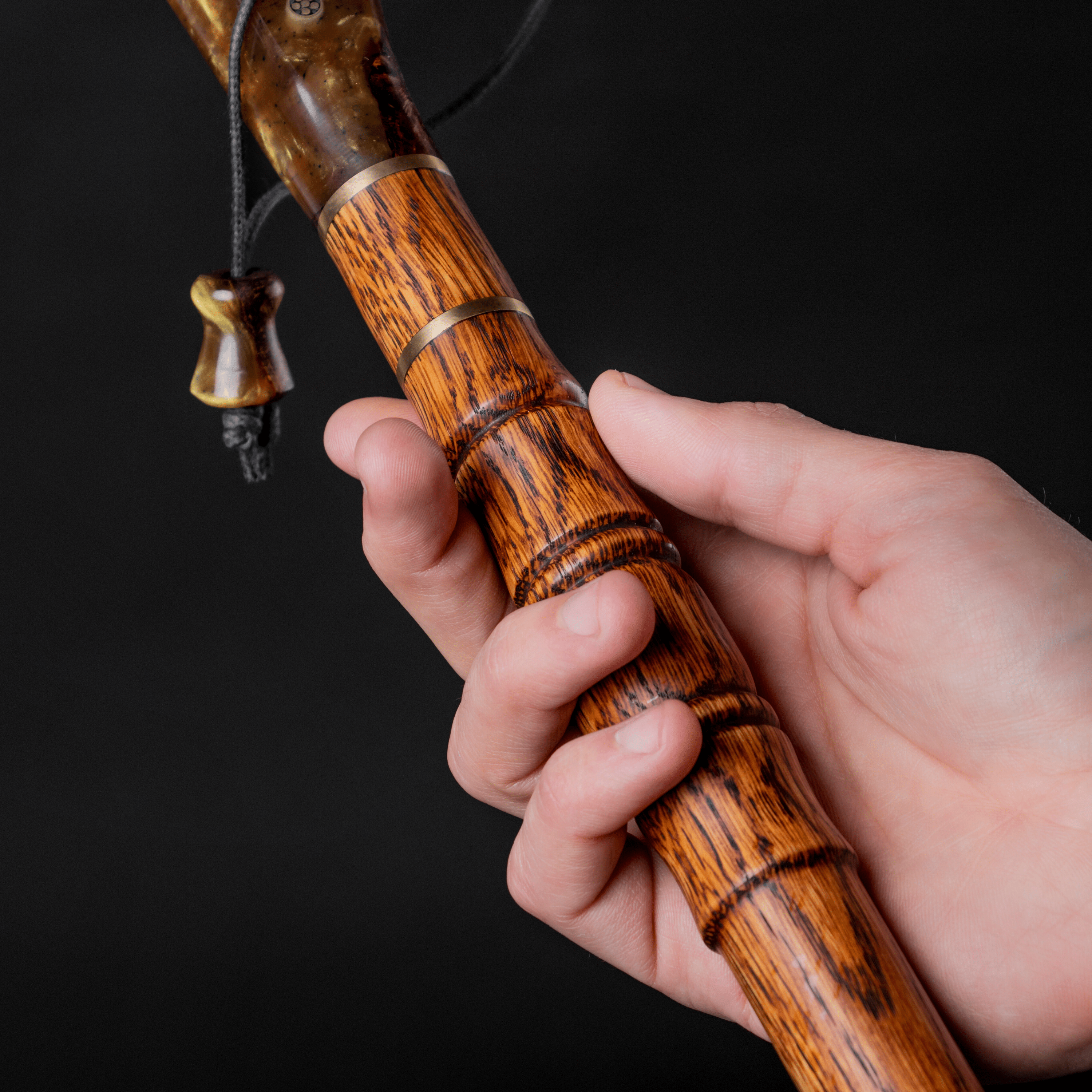 Handmade JUPITER walking cane by ARTWalkingSticks with strap and cord, stylish mobility aid with unique design and ergonomic handle.